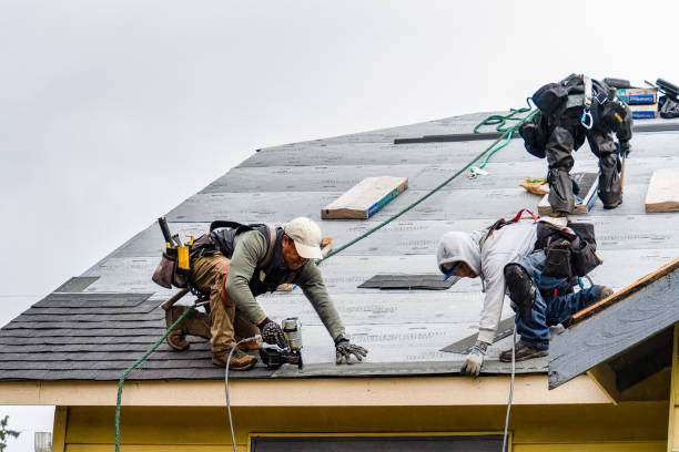 Professional Roofing technician working in Shelter Island Heights, NY